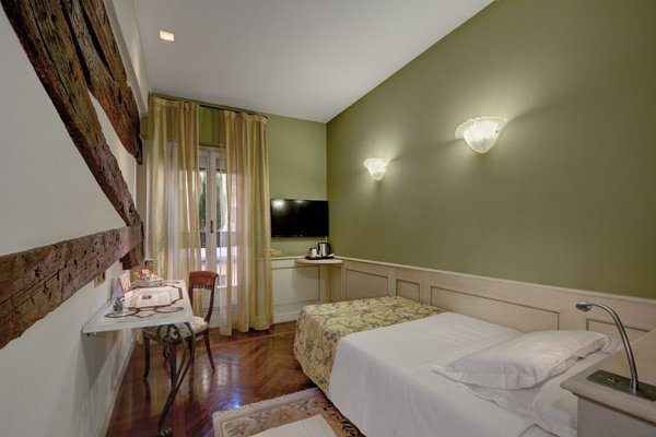 Habitación individual art hotel commercianti bolonia Habitación individual art hotel commercianti bolonia