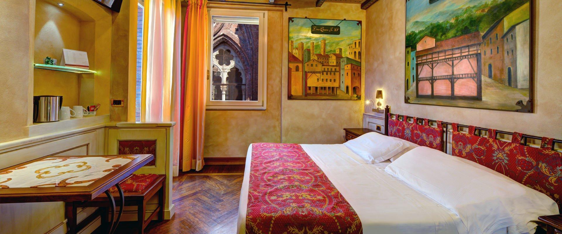 ART HOTEL COMMERCIANTI: A HISTORY WAITING TO BE DISCOVERED Art Hotel Commercianti Bolonia ART HOTEL COMMERCIANTI: A HISTORY WAITING TO BE DISCOVERED Art Hotel Commercianti Bolonia